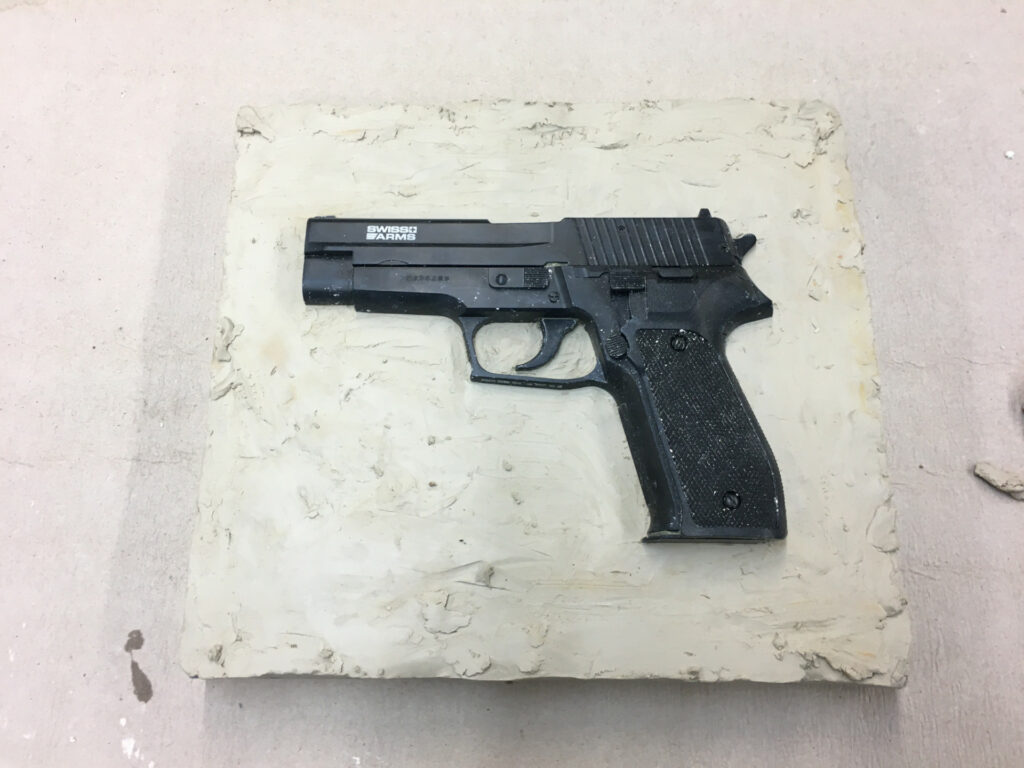 DINA ZAITEV hold my gun 14 Sig Sauer P226 replica, epoxy resin, colored plaster, February 2021